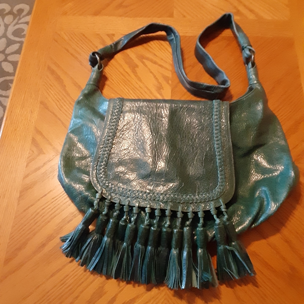 Jessica Simpson crossbody bag with tassels.